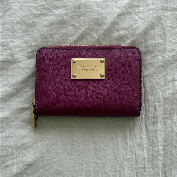 Michael Kors Handbags - Michael Kors Plum Saffiano Zip Around Wallet with Gold Plate